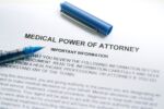Close-up of a medical power of attorney document. Visual concept for estate planning blog discussing 5 key facts about Medical Power of Attorney in California.